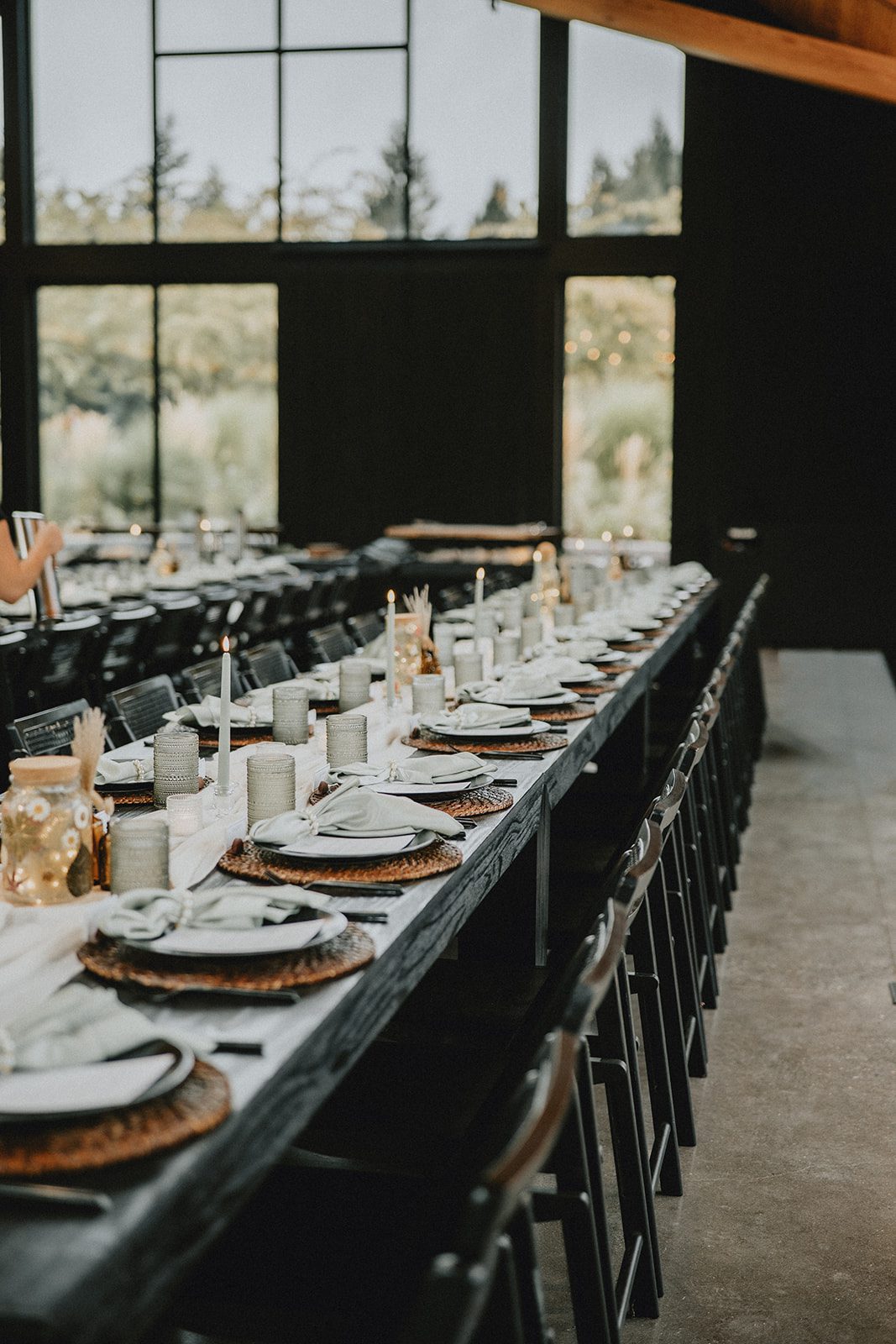 wind-mountain-ranch-rustic-portland-cj-rachel-p004-09 Long reception tables inside the lodge at Wind Mountain Ranch