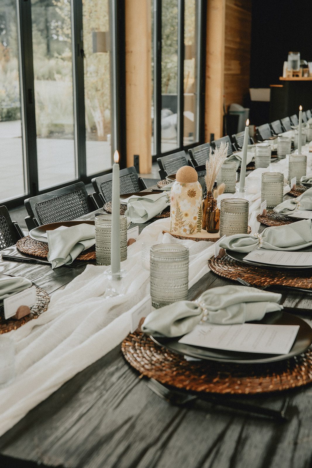 wind-mountain-ranch-rustic-portland-cj-rachel-p005-11 Table settings with mountain views through the windows