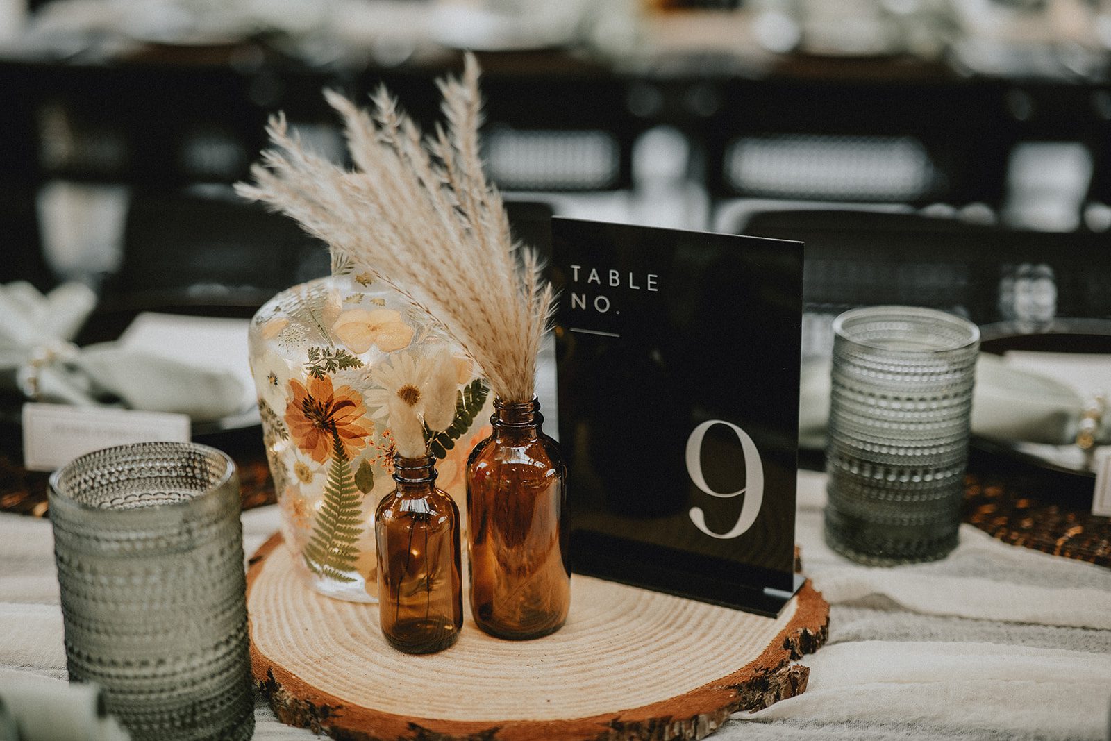 wind-mountain-ranch-rustic-portland-cj-rachel-p006-03 Table details with dried flowers and candles