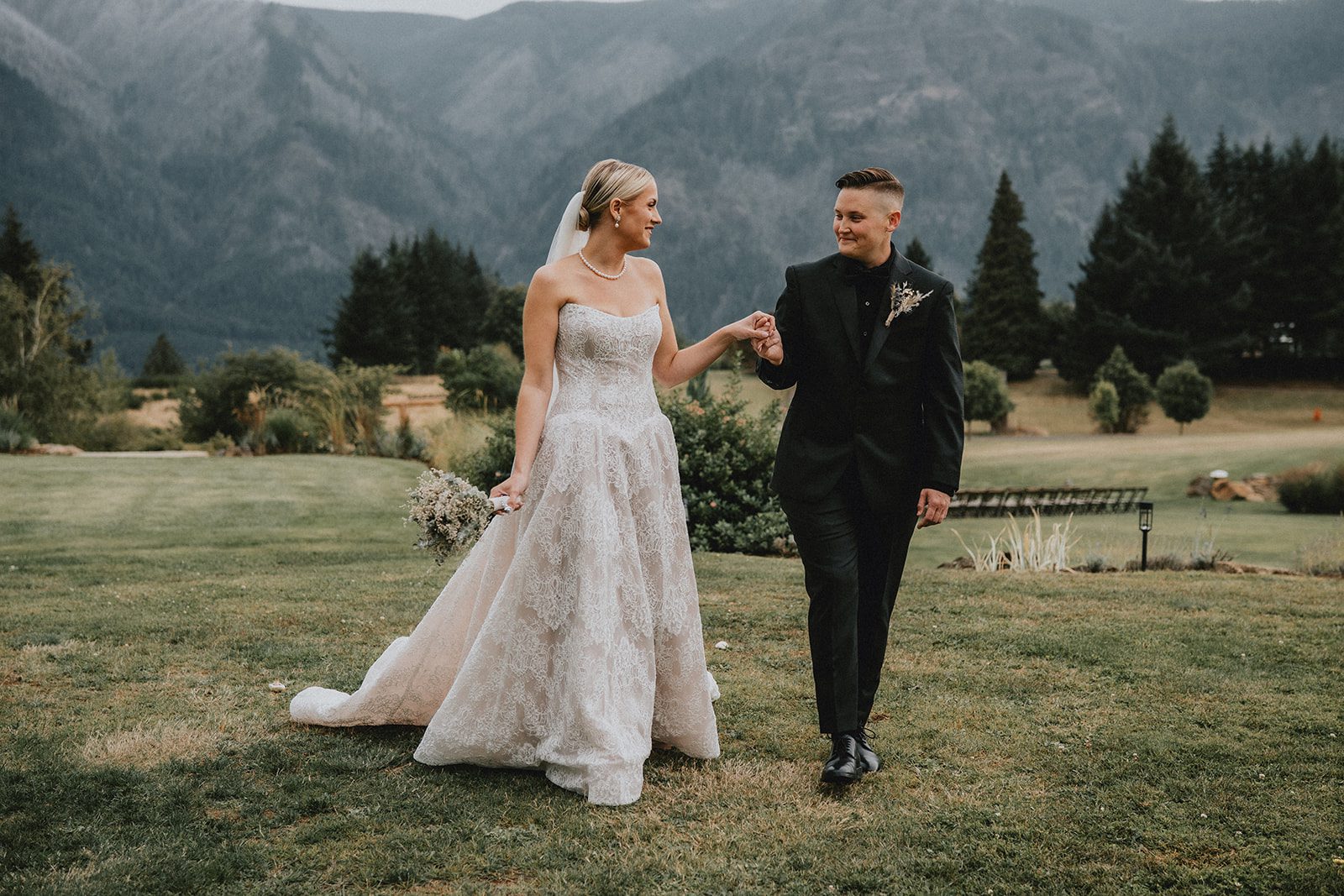 wind-mountain-ranch-rustic-portland-cj-rachel-p024-11 Couple walking hand in hand