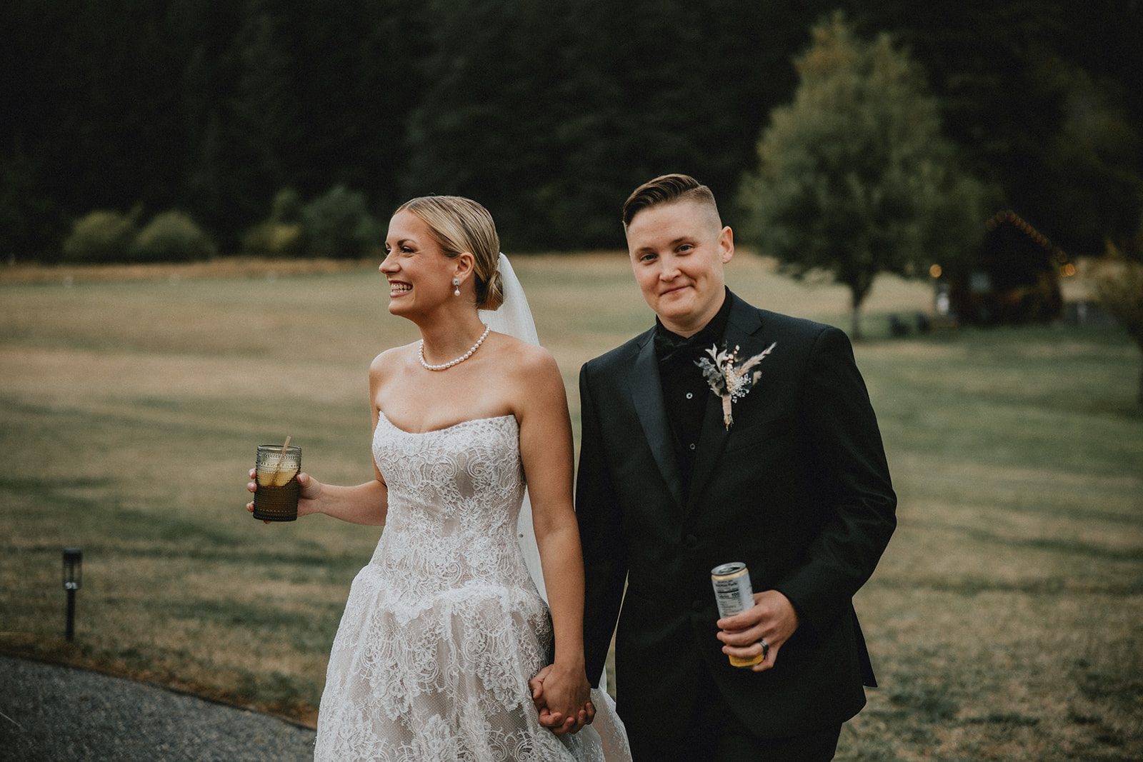 wind-mountain-ranch-rustic-portland-cj-rachel-p028-10 Couple laughing in the field, captured by Portland wedding photographers