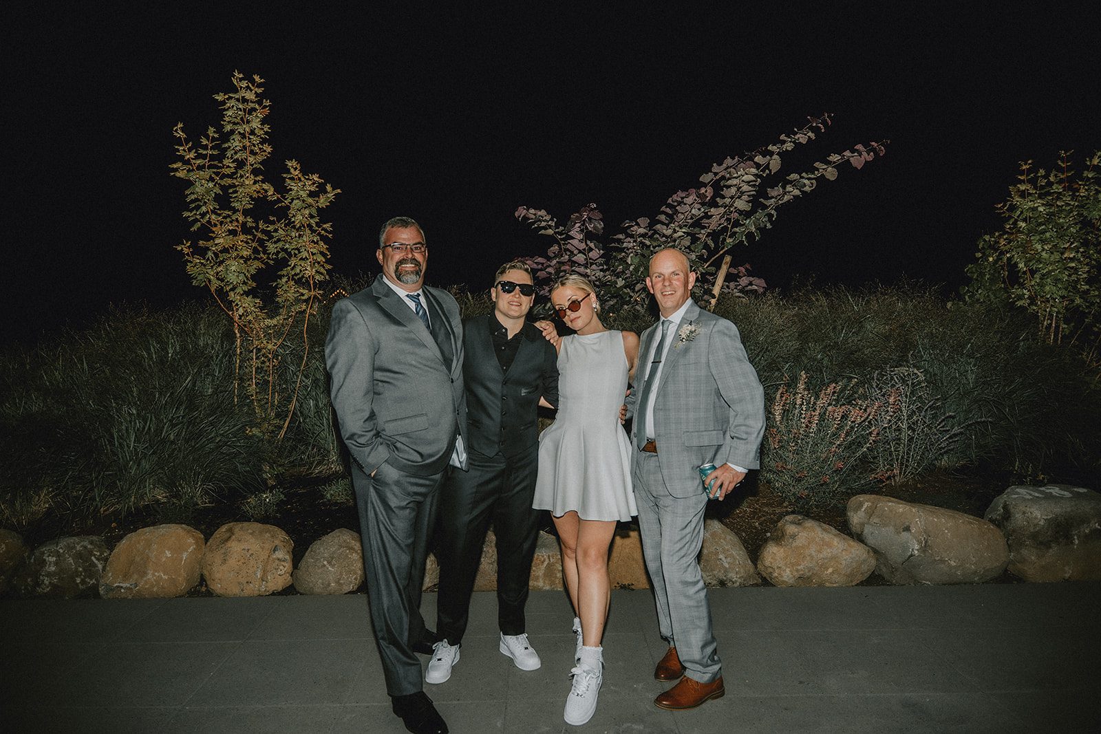 wind-mountain-ranch-rustic-portland-cj-rachel-p037-11 Guests celebrating outside at night