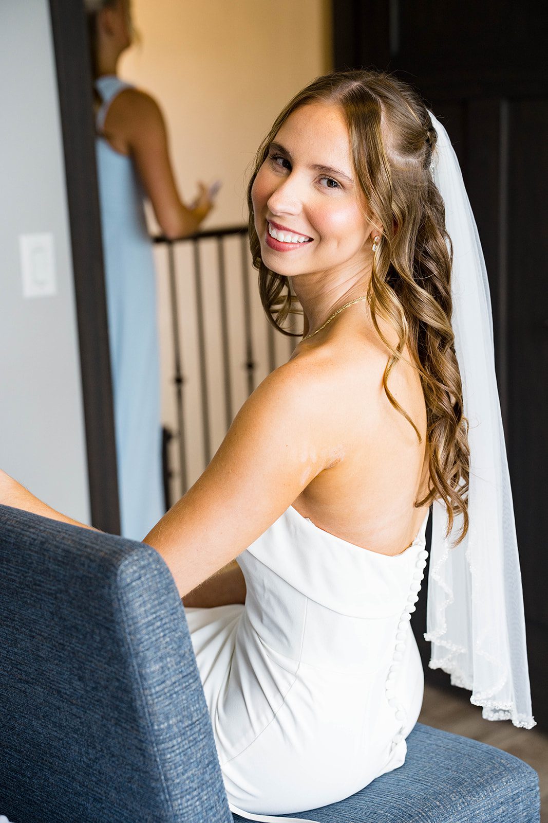 Bride smiling in her wedding dress