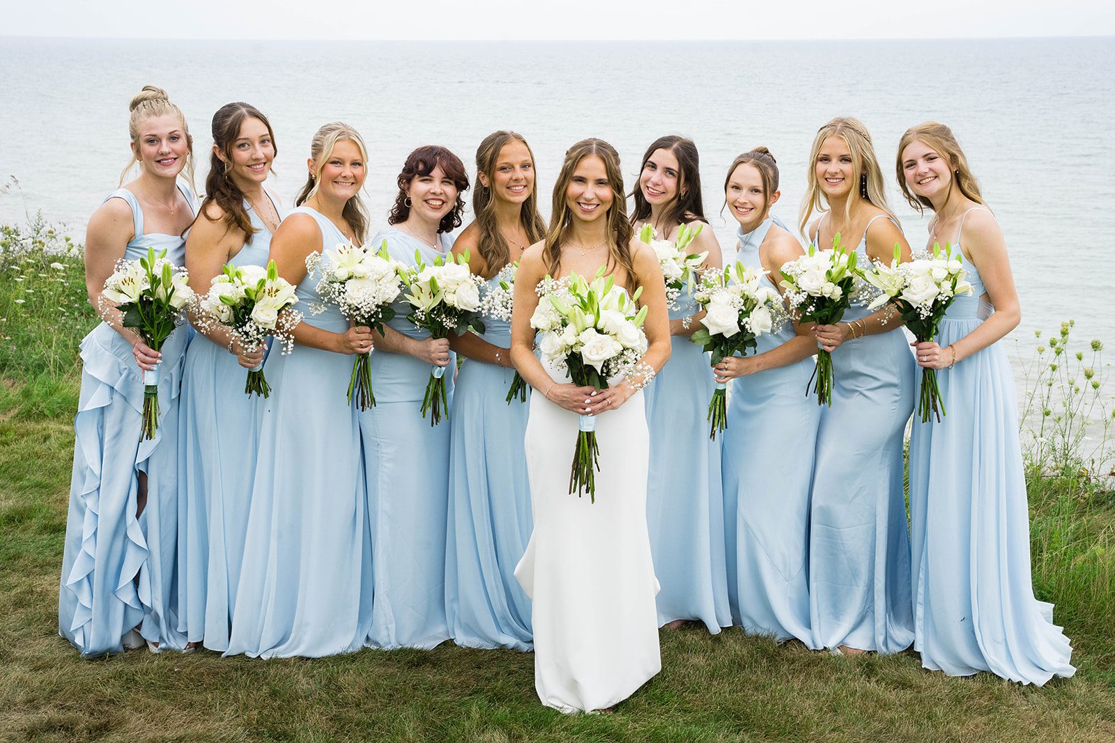 Bride with her bridesmaids in pastel blue
