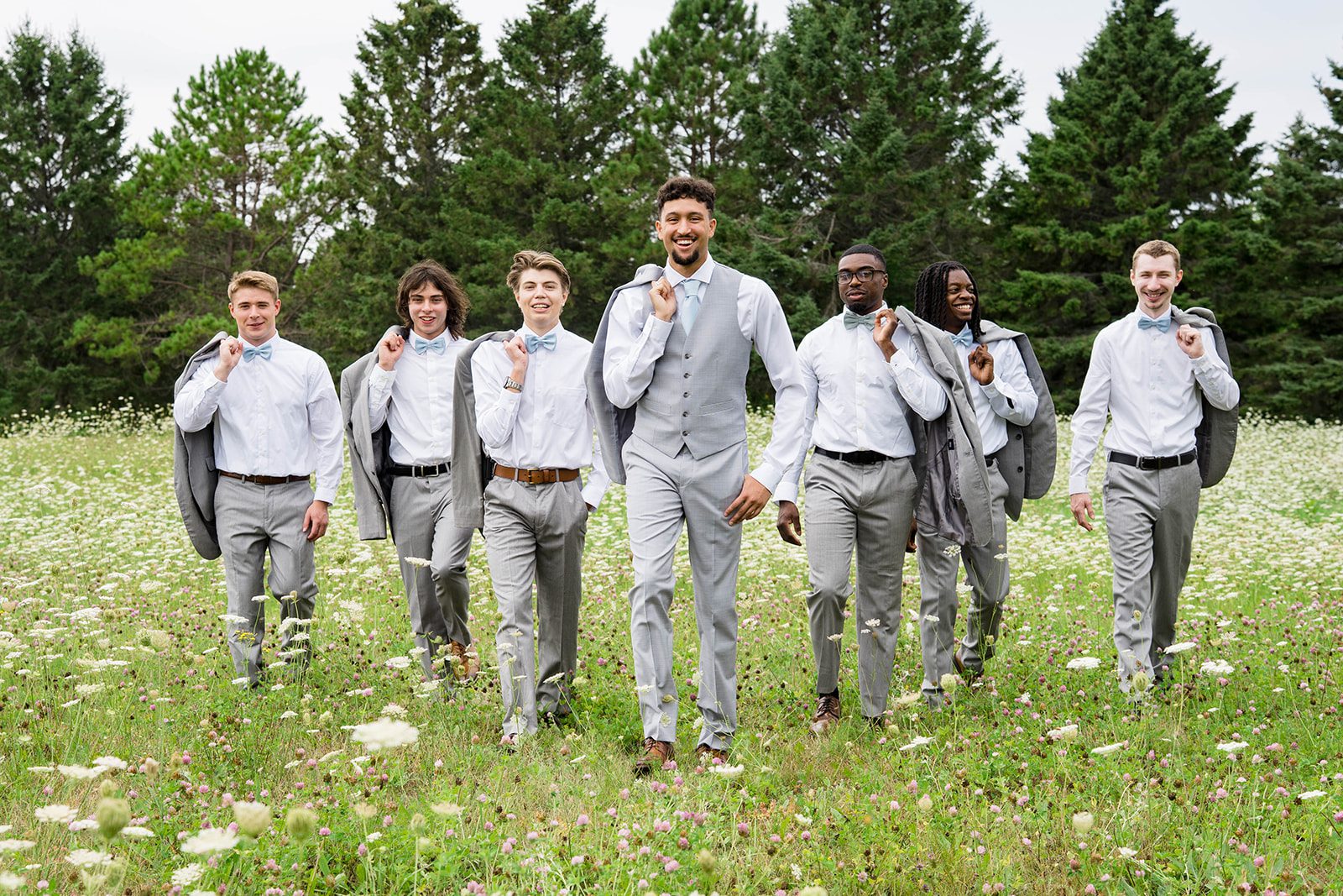 Groom with his groomsmen on the lawn