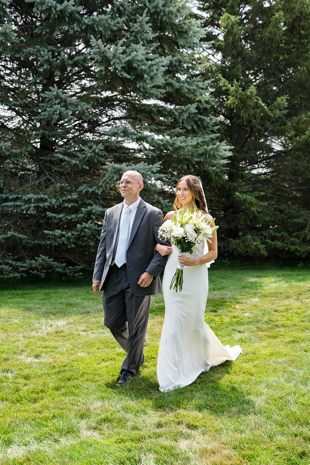 Bride walking down the aisle with her father