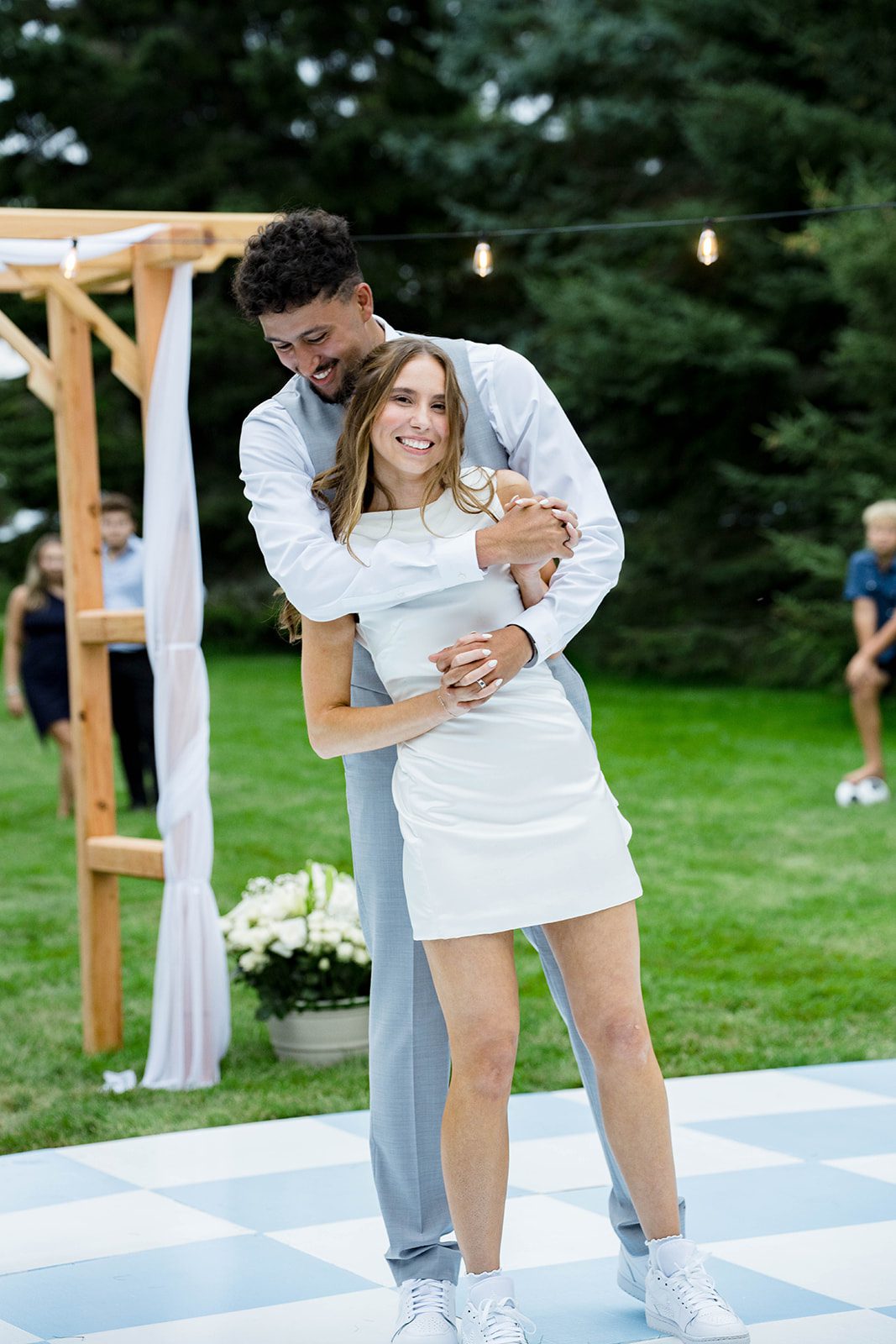 Couple sharing their first dance under the tent