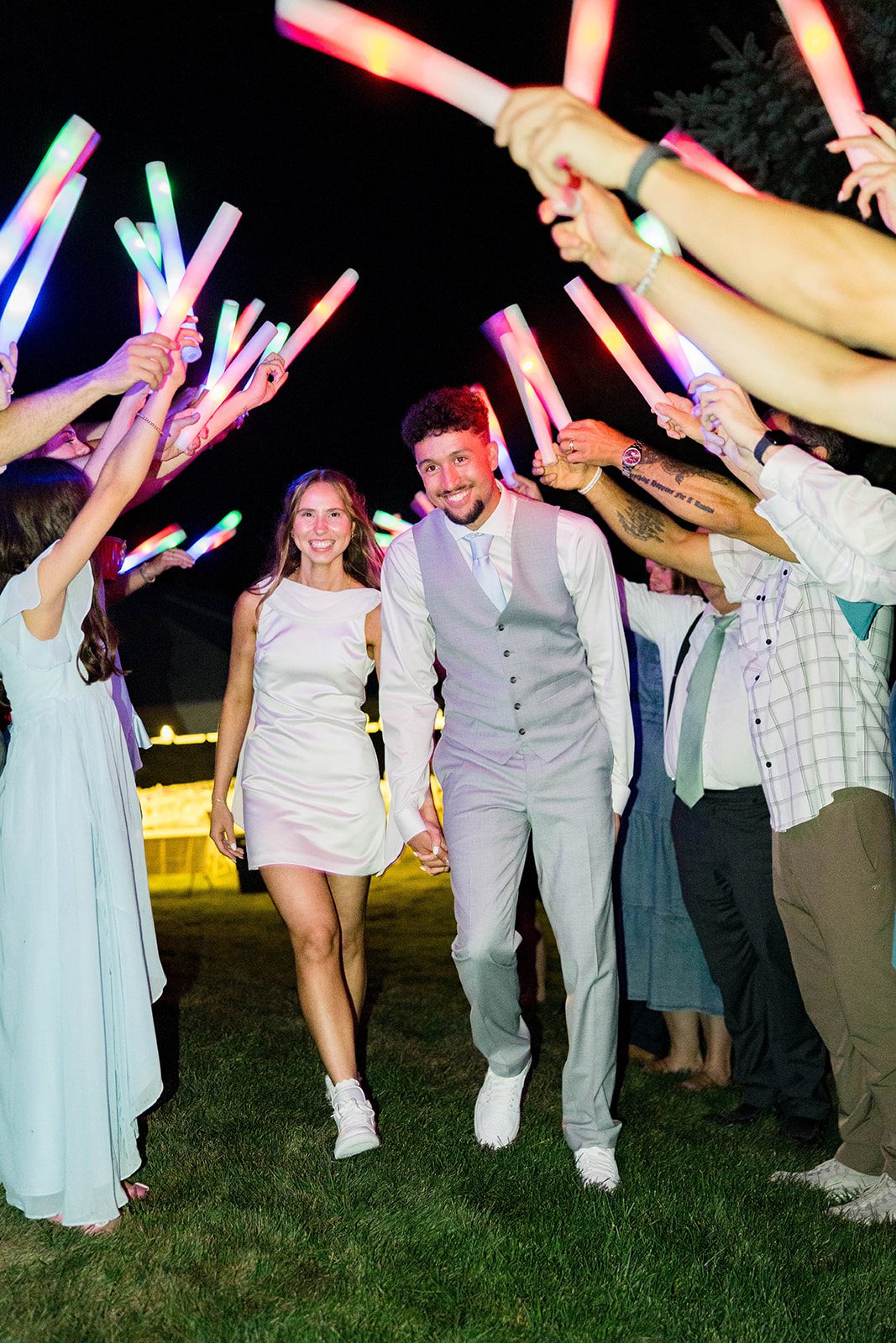 Friends celebrating with glow sticks