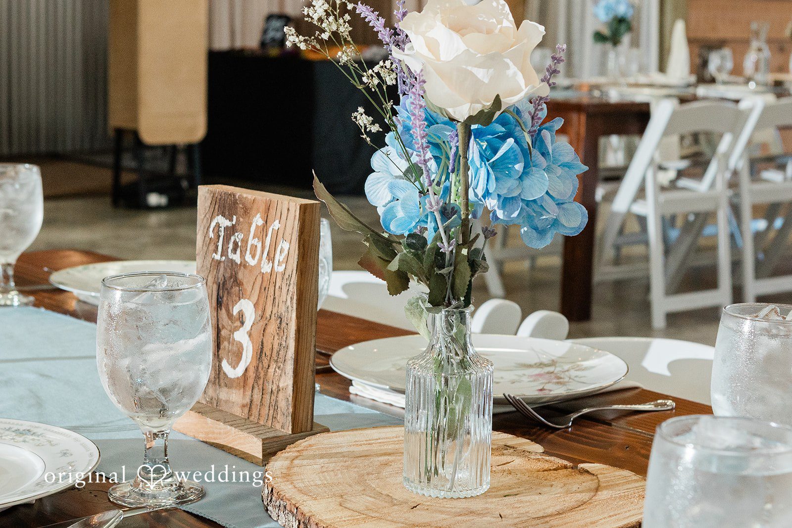 Rachel + Matt Table number with blue hydrangeas