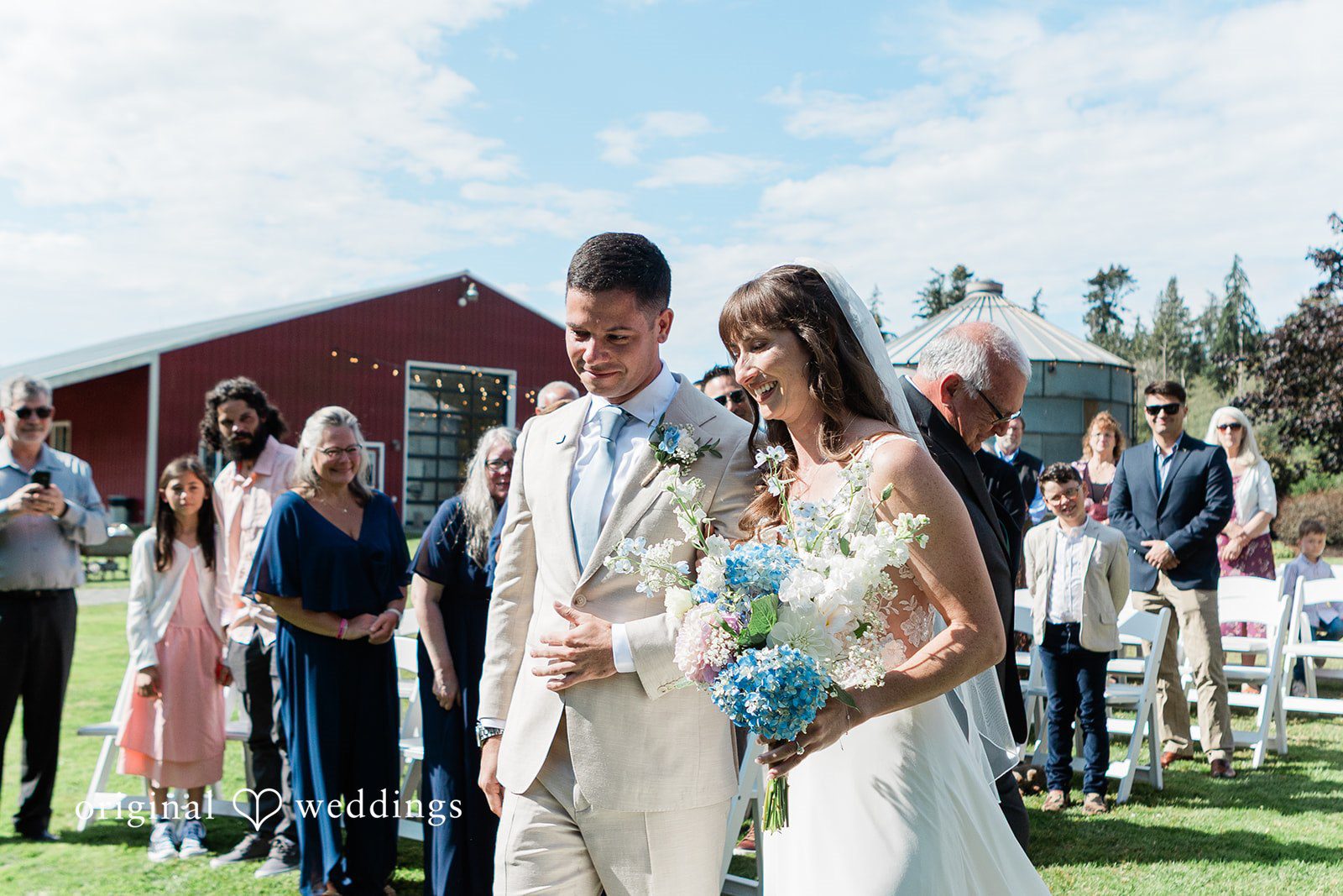 Rachel + Matt Couple celebrating with guests after the ceremony