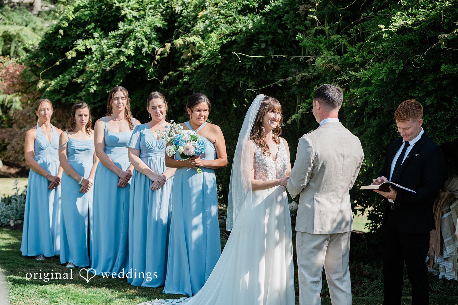 Rachel + Matt Wedding party standing with the couple during the ceremony