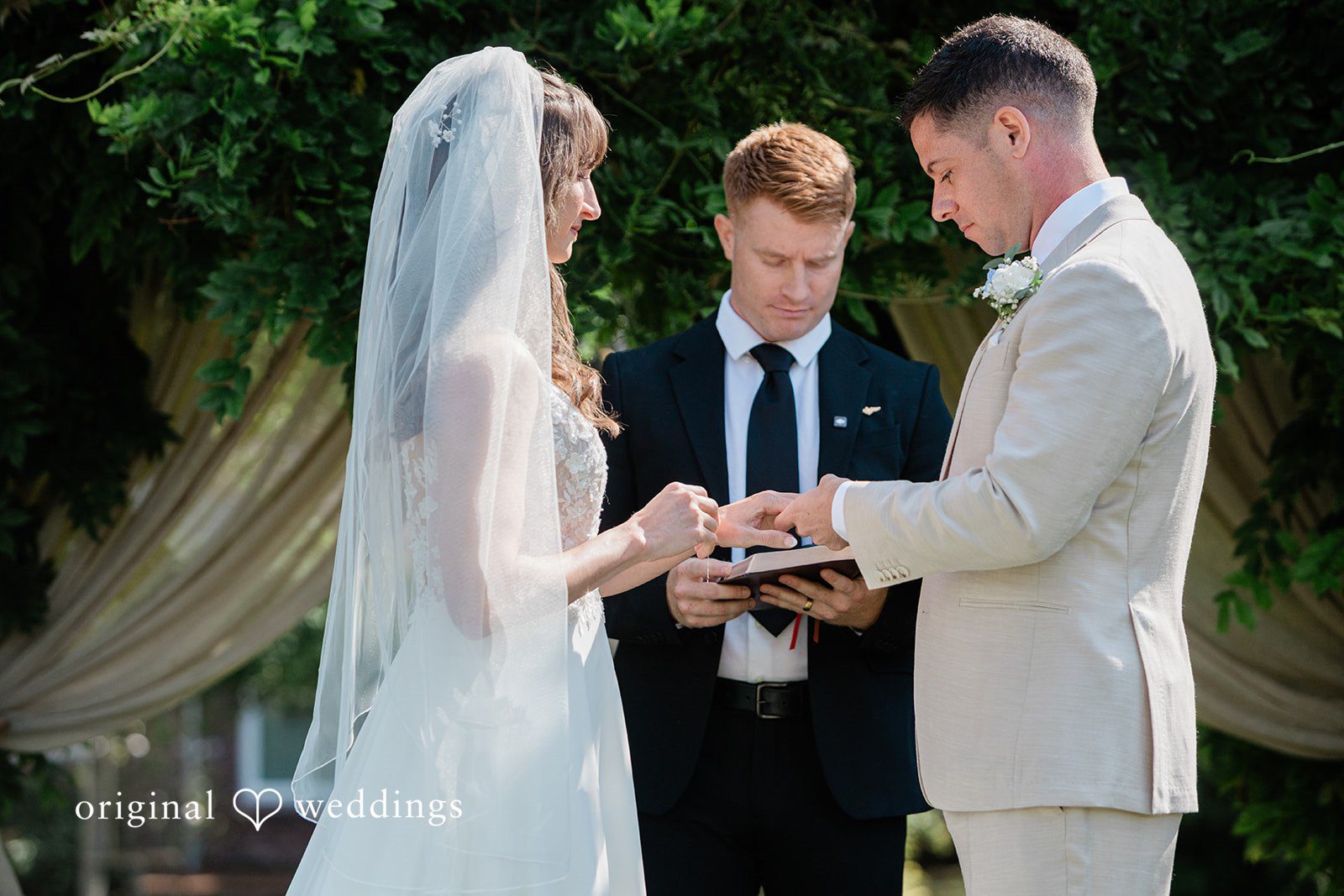 Rachel + Matt Rachel and Matt exchanging rings