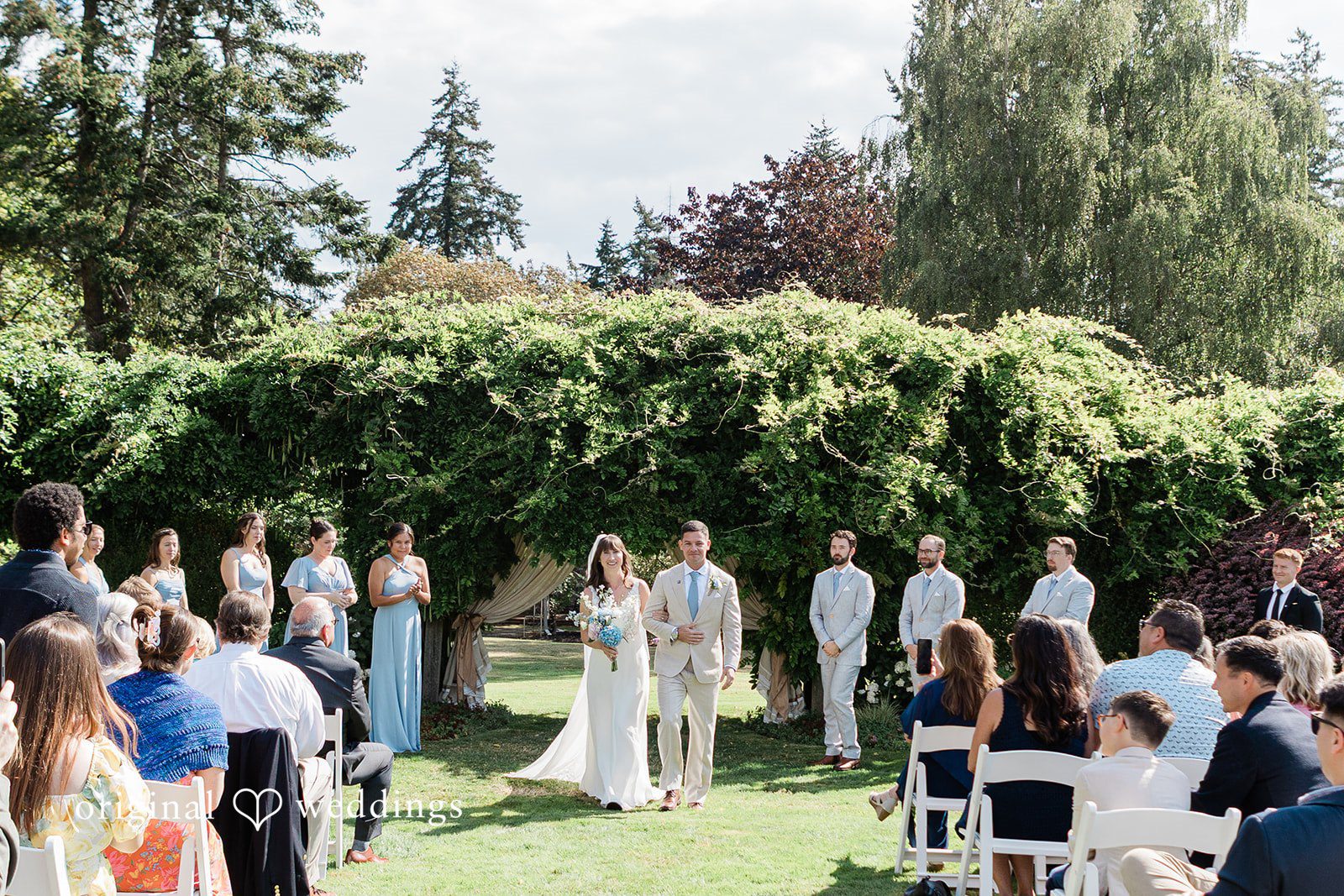 Rachel + Matt Garden ceremony with guests seated at Wisteria Gardens