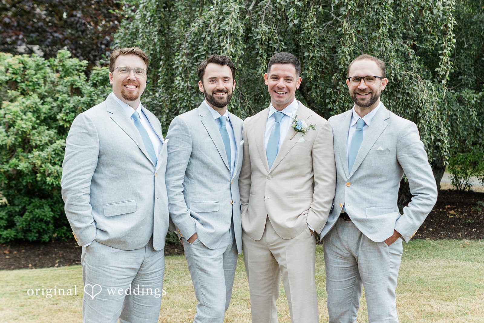 Rachel + Matt Groom and groomsmen in light gray suits