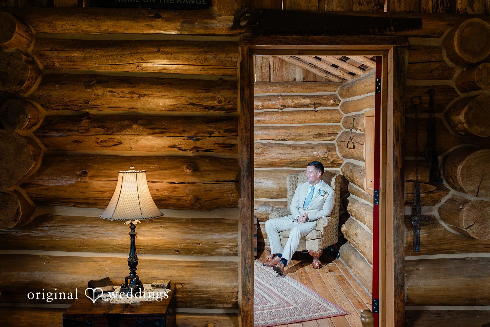 Rachel + Matt Cozy log cabin interior at Wisteria Gardens