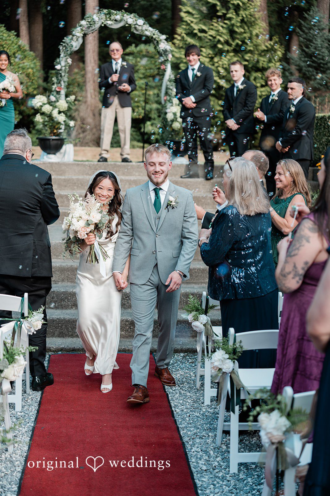 Sophie + Taylor The couple makes a grand exit after their wedding ceremony