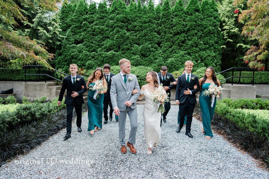 Sophie + Taylor Our Seattle wedding photographers captured a stunning portrait of the couple and their bridal party at the Woodinville Wonderland