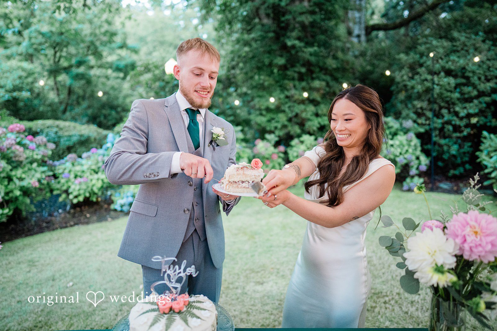Sophie + Taylor The couple cuts their wedding cake