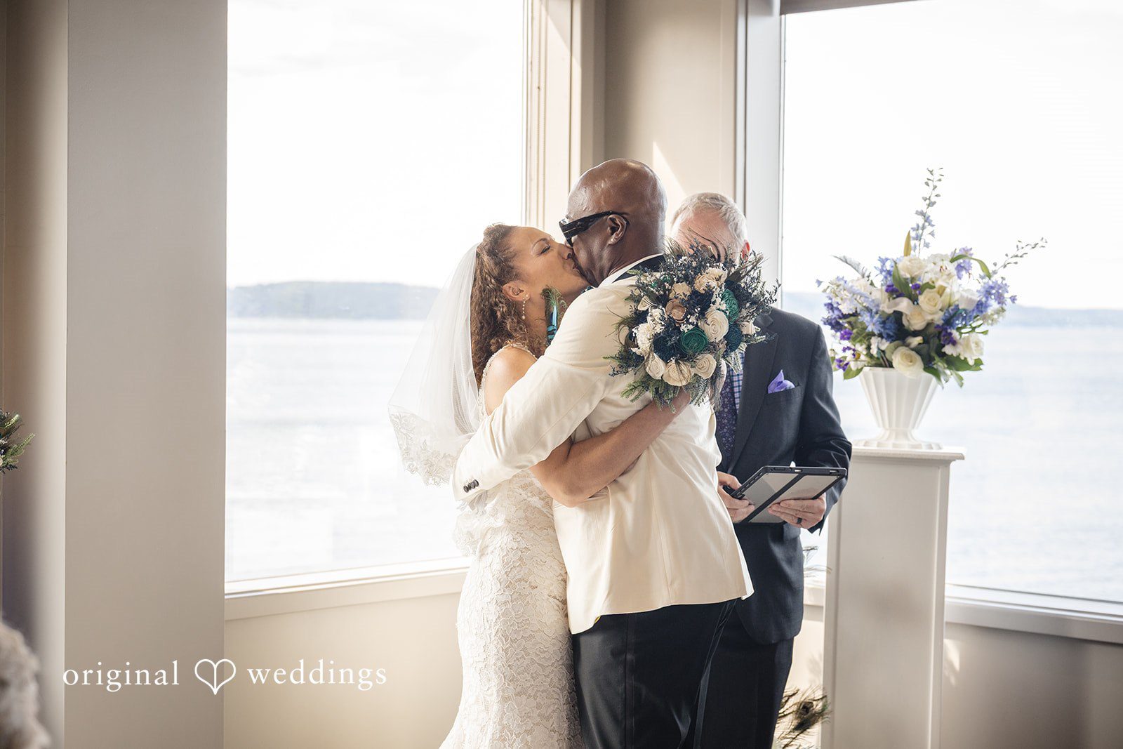 Jennifer + Tony A bride and groom embracing and sharing a close moment together.
